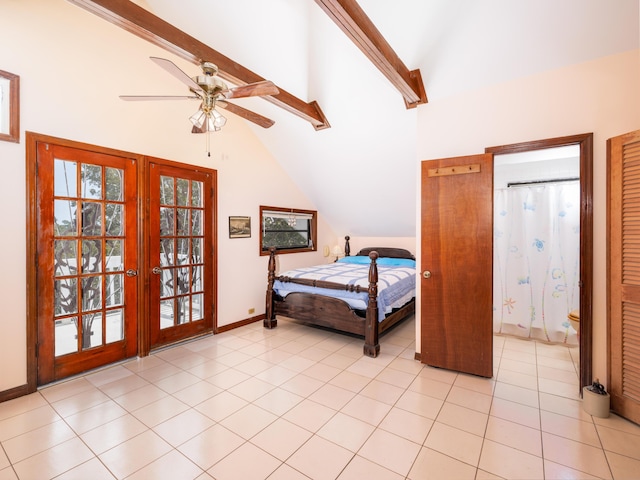 bedroom featuring a ceiling fan, baseboards, light tile patterned flooring, vaulted ceiling, and french doors