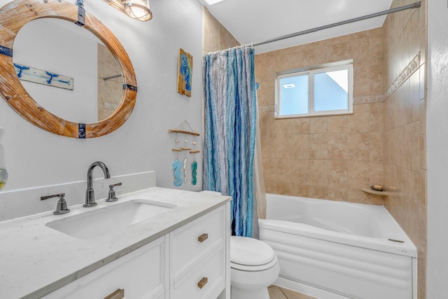 full bath featuring shower / bath combo, vanity, and toilet