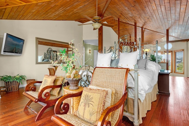 dining space with hardwood / wood-style flooring, vaulted ceiling, wooden ceiling, and ceiling fan