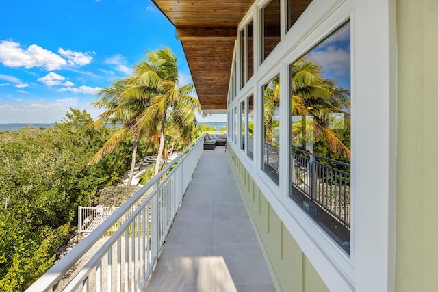 balcony featuring a water view