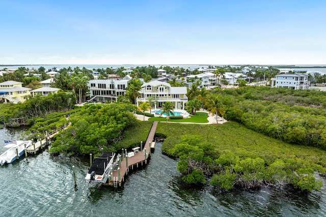 bird's eye view with a water view