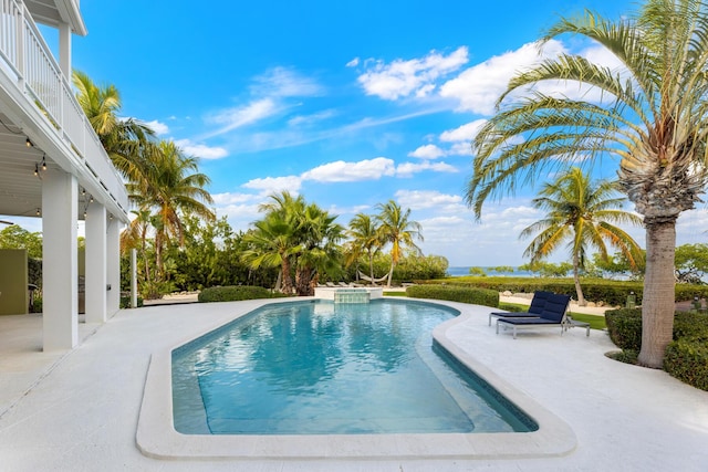 view of swimming pool featuring a patio