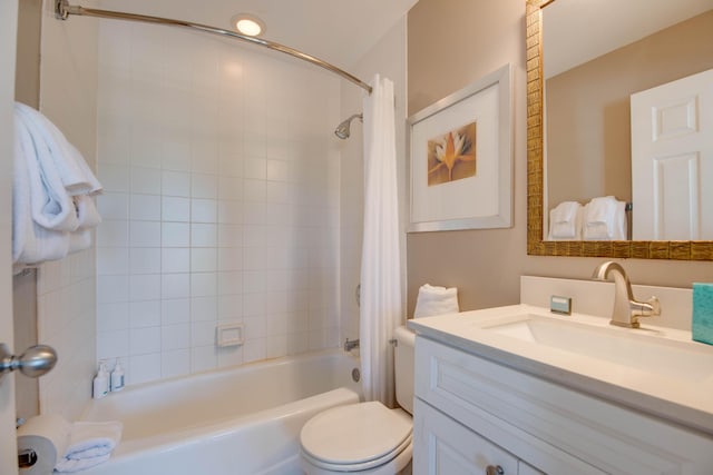 full bathroom featuring vanity, toilet, and shower / tub combo