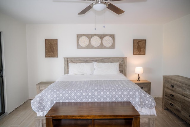 88181 Old Hwy Unit 3F, Islamorada, FL 33036 - bedroom with wood finished floors and a ceiling fan