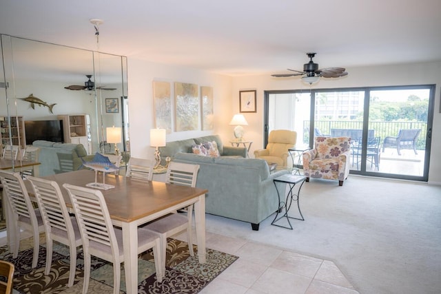 88181 Old Hwy Unit 3F, Islamorada, FL 33036 - dining room with ceiling fan, light tile patterned floors, and light colored carpet