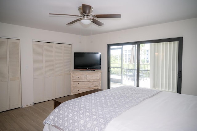 88181 Old Hwy Unit 3F, Islamorada, FL 33036 - bedroom featuring multiple closets, wood finished floors, access to exterior, and a ceiling fan