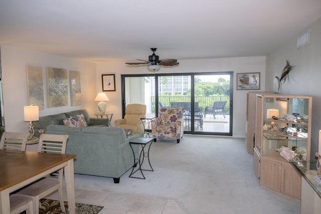 88181 Old Hwy Unit 3F, Islamorada, FL 33036 - living room featuring ceiling fan and light carpet