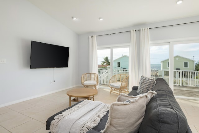 living room featuring lofted ceiling