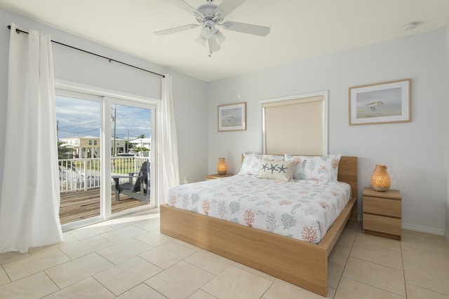 tiled bedroom with access to outside and ceiling fan