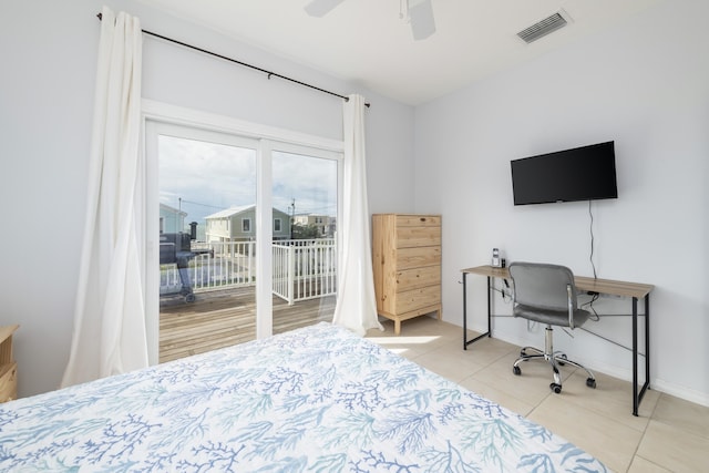 bedroom featuring access to outside, ceiling fan, and light tile patterned flooring