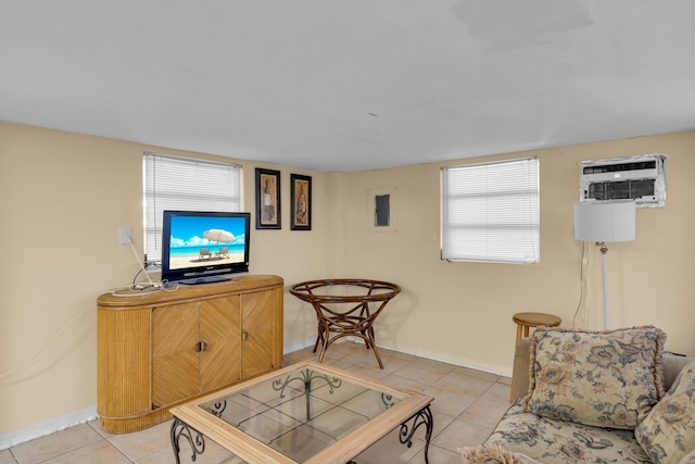 tiled living room with a wall mounted AC