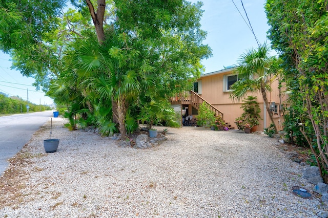 view of yard featuring a wooden deck