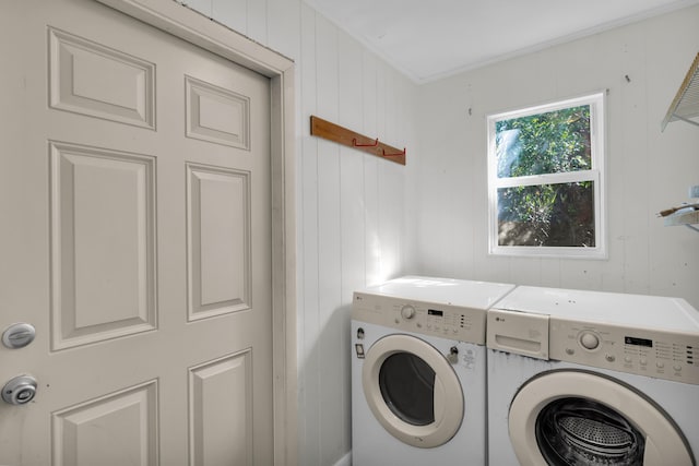 laundry room featuring washer and clothes dryer