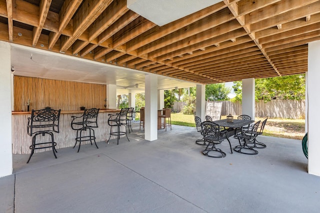 view of patio / terrace with an outdoor bar