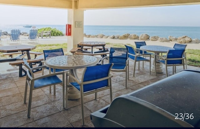 view of patio / terrace featuring a water view