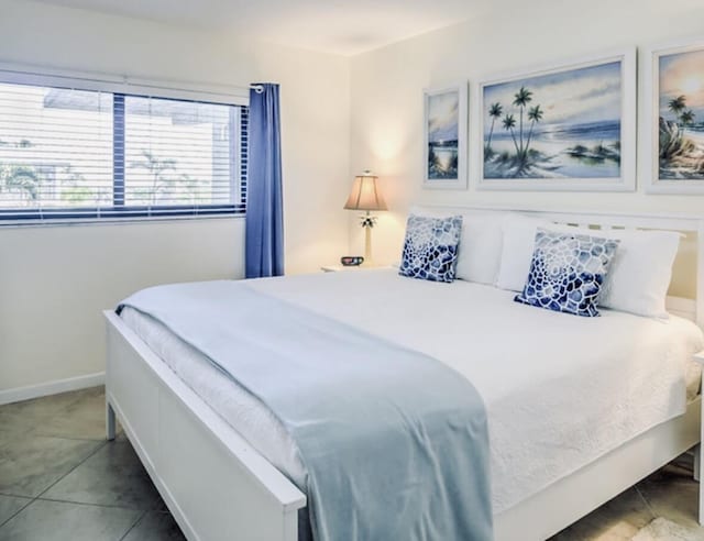 bedroom with tile patterned flooring