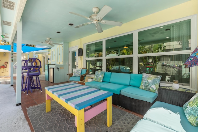 view of patio with an outdoor hangout area and ceiling fan