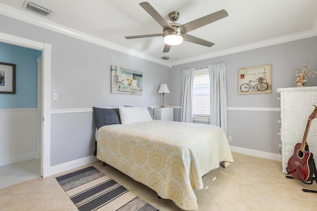 bedroom with light tile patterned floors, ornamental molding, and ceiling fan