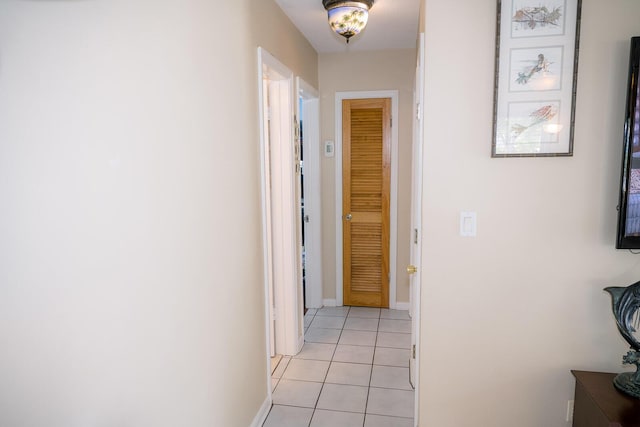 768 Musa Dr, Key Largo, FL 33037 - hall featuring light tile patterned floors and baseboards
