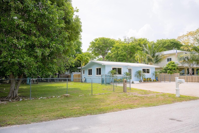 768 Musa Dr, Key Largo, FL 33037 - manufactured / mobile home with driveway and stucco siding