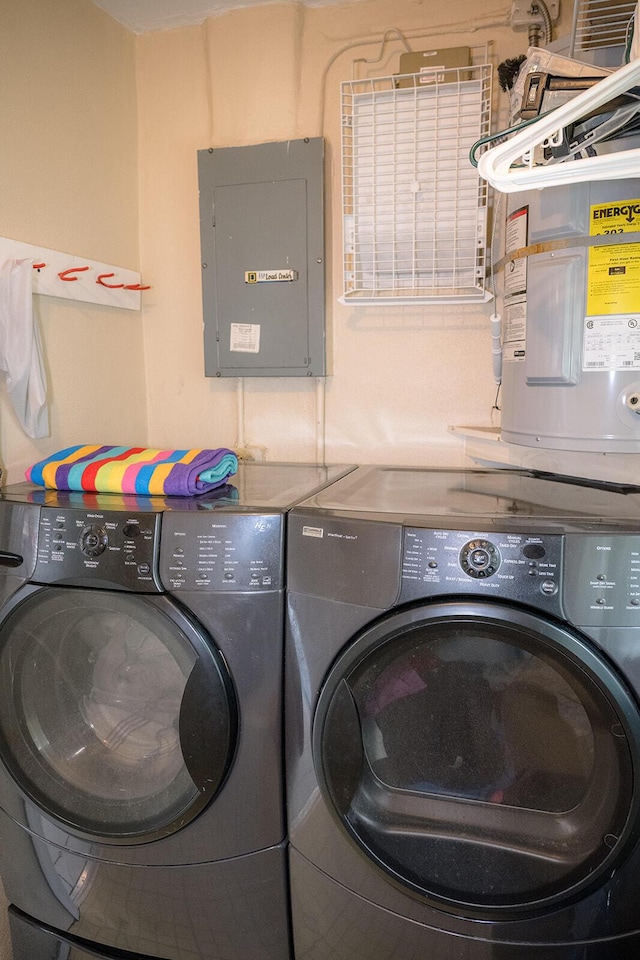 768 Musa Dr, Key Largo, FL 33037 - laundry room featuring electric panel and independent washer and dryer