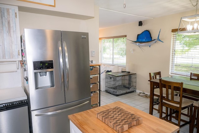 768 Musa Dr, Key Largo, FL 33037 - kitchen featuring appliances with stainless steel finishes and light tile patterned floors