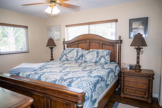 768 Musa Dr, Key Largo, FL 33037 - bedroom featuring multiple windows, dark wood finished floors, and a ceiling fan