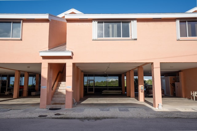 exterior space with a carport