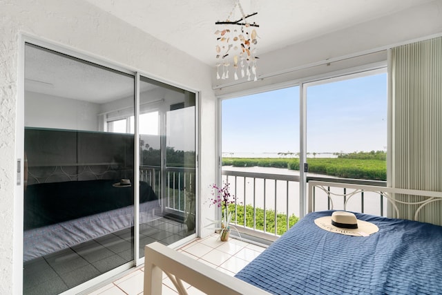 sunroom with a notable chandelier