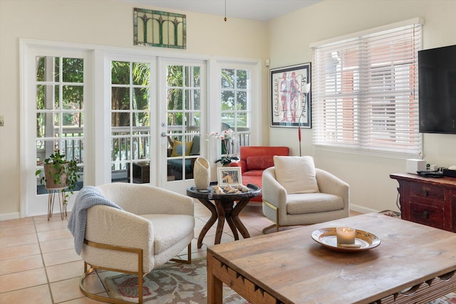 interior space featuring baseboards and light tile patterned floors