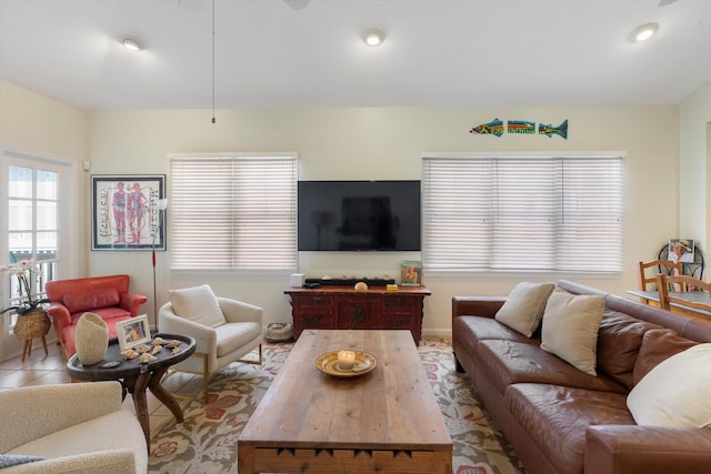 living room featuring light tile patterned floors and recessed lighting