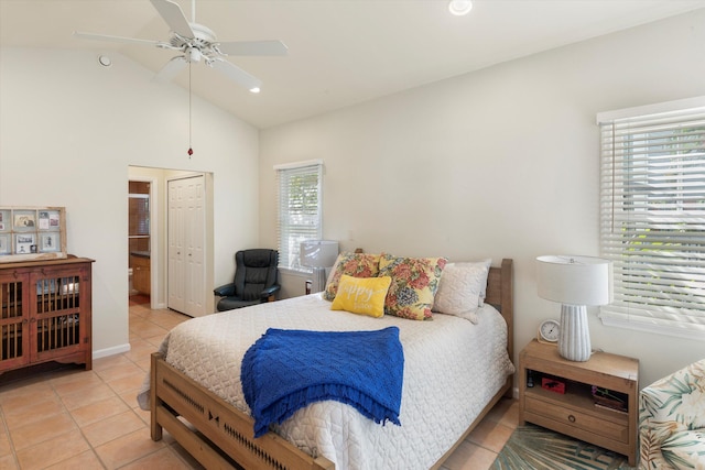 bedroom featuring light tile patterned floors, lofted ceiling, a closet, recessed lighting, and ceiling fan