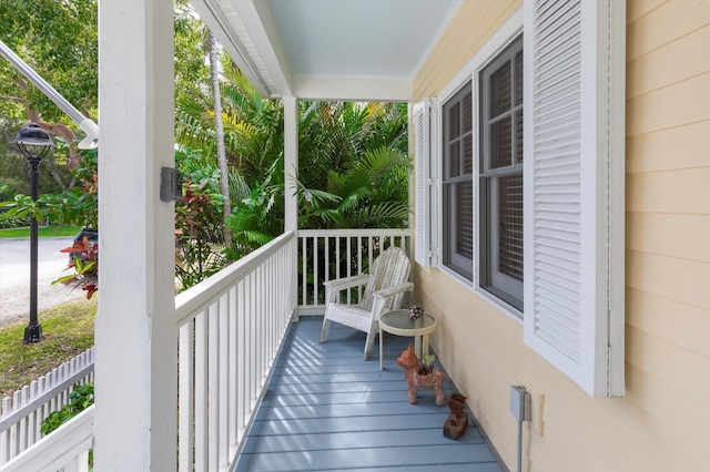 balcony featuring a porch