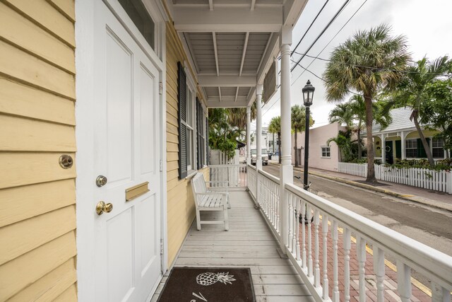 balcony featuring a porch