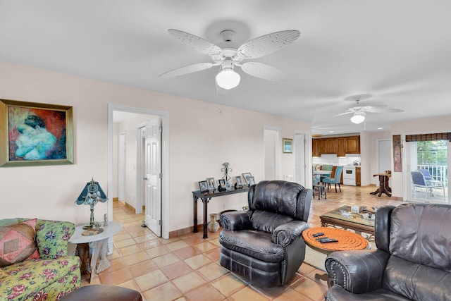 living room featuring light tile patterned flooring and ceiling fan