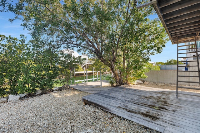 view of yard featuring a wooden deck