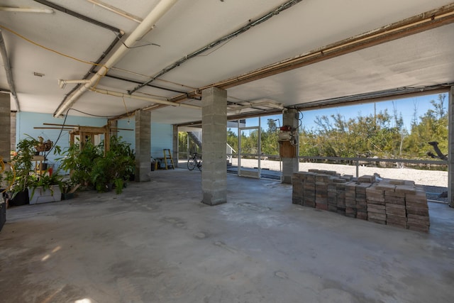 view of patio featuring a lanai