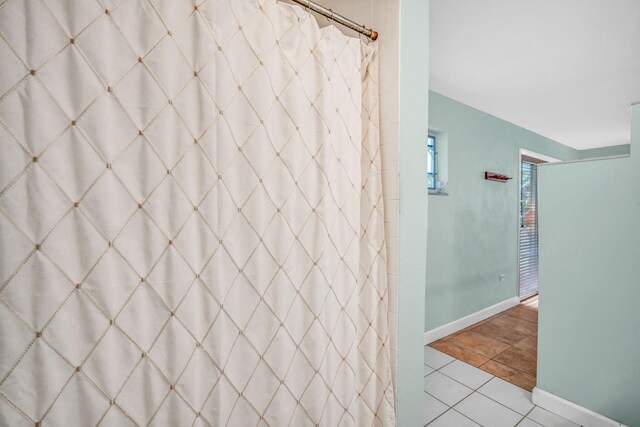 bathroom with tile patterned flooring