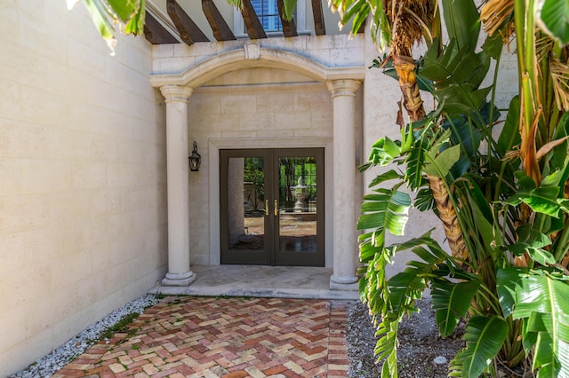 doorway to property featuring french doors