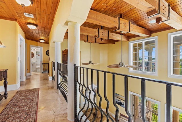 corridor with beam ceiling and wooden ceiling