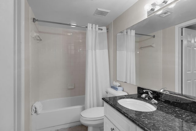 full bathroom with shower / tub combo, vanity, and toilet