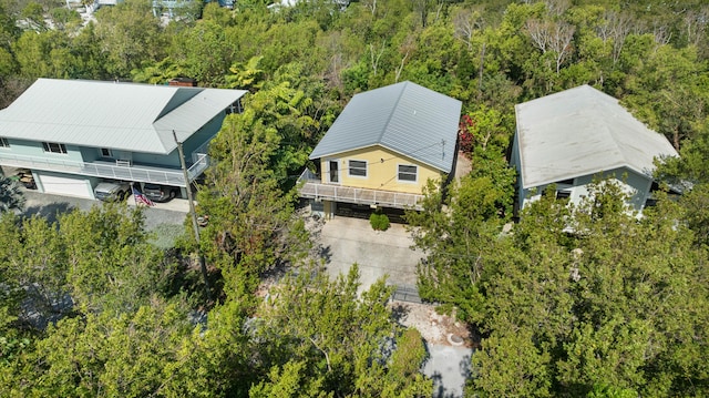 view from above of property featuring a forest
