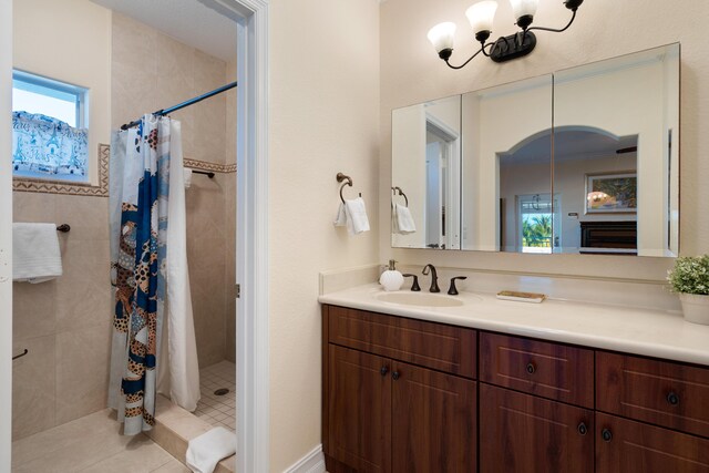 bathroom featuring vanity and a shower with curtain