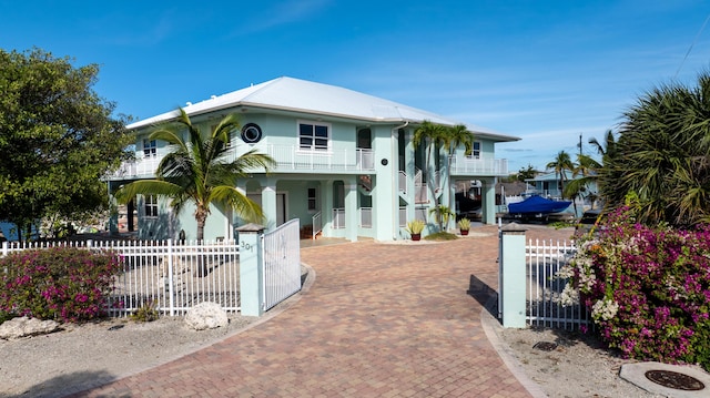 view of front of home with a balcony