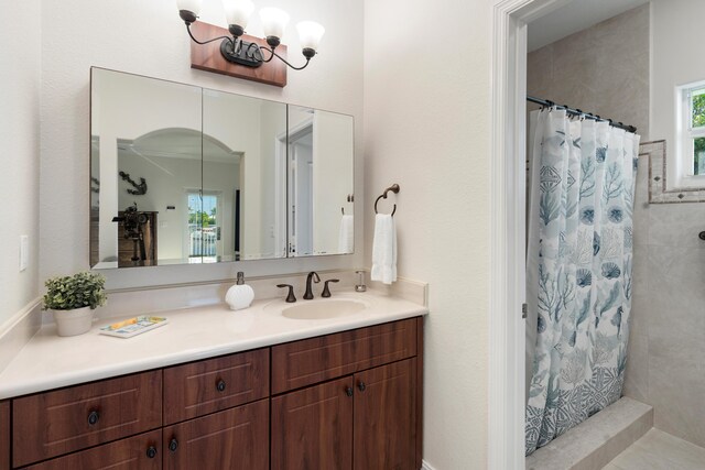 bathroom with vanity and walk in shower