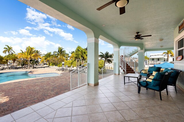 view of patio with ceiling fan