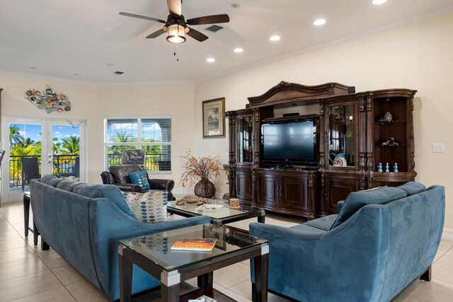 tiled living room with ceiling fan, crown molding, and french doors