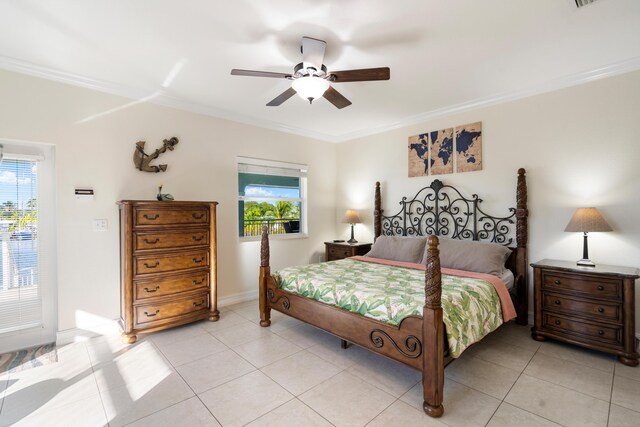 tiled bedroom with crown molding and ceiling fan