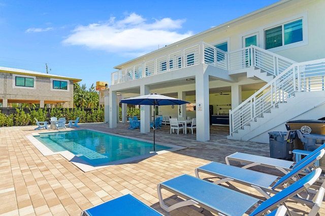 view of pool featuring a patio area