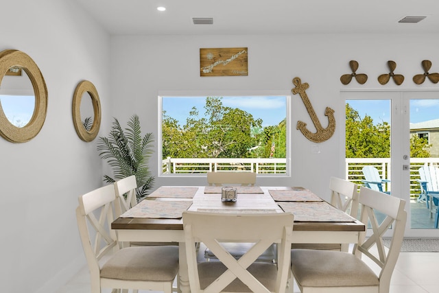 dining area with french doors and plenty of natural light